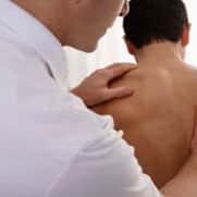 Osteopath with client